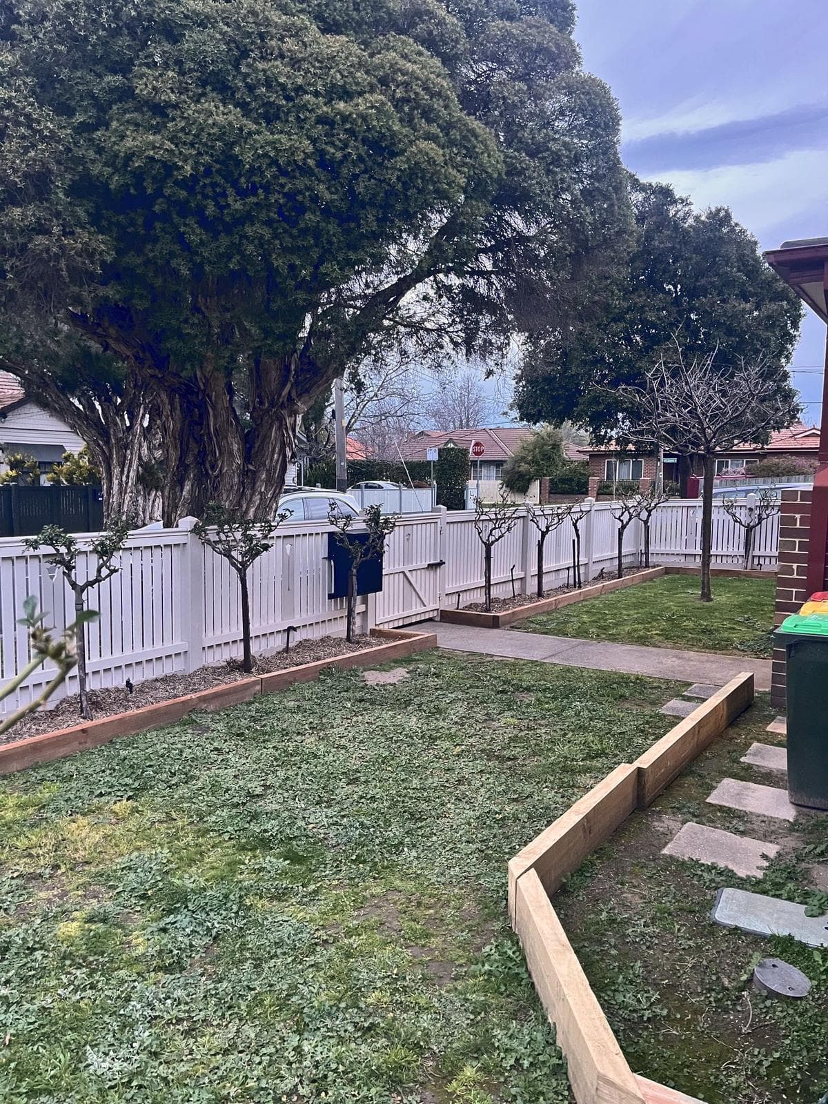 Front lawn with timber edging and stepping pavers, Carnegie