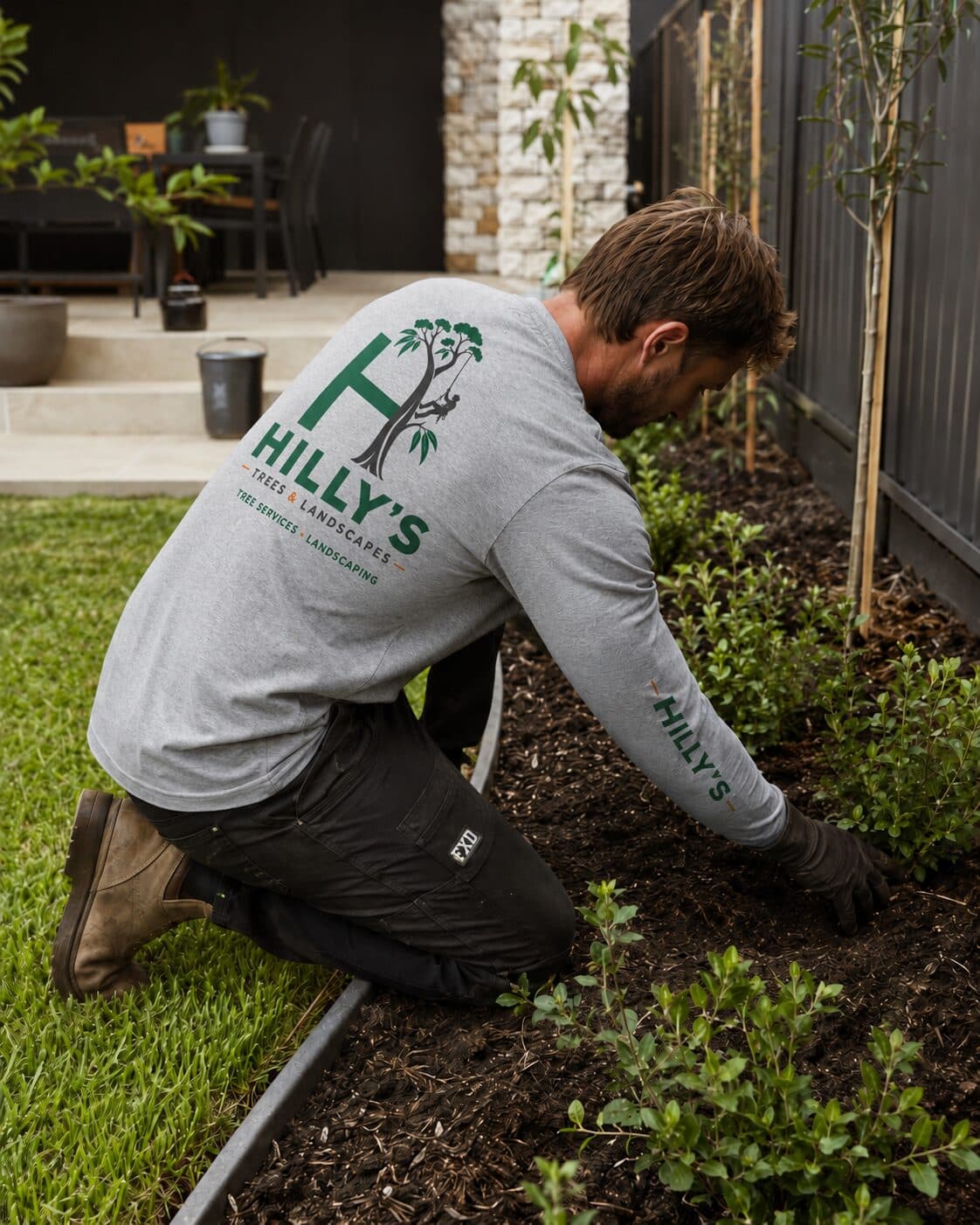 New planting along the edge of a freshly laid lawn at a Melbourne home