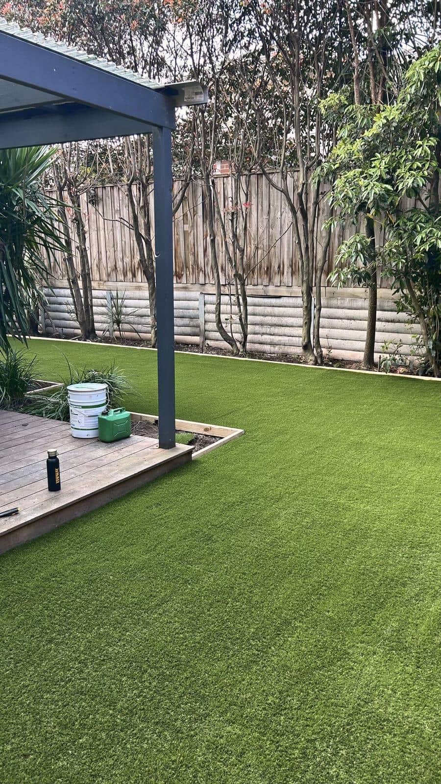 Synthetic lawn beside the timber deck under the pergola, Burwood